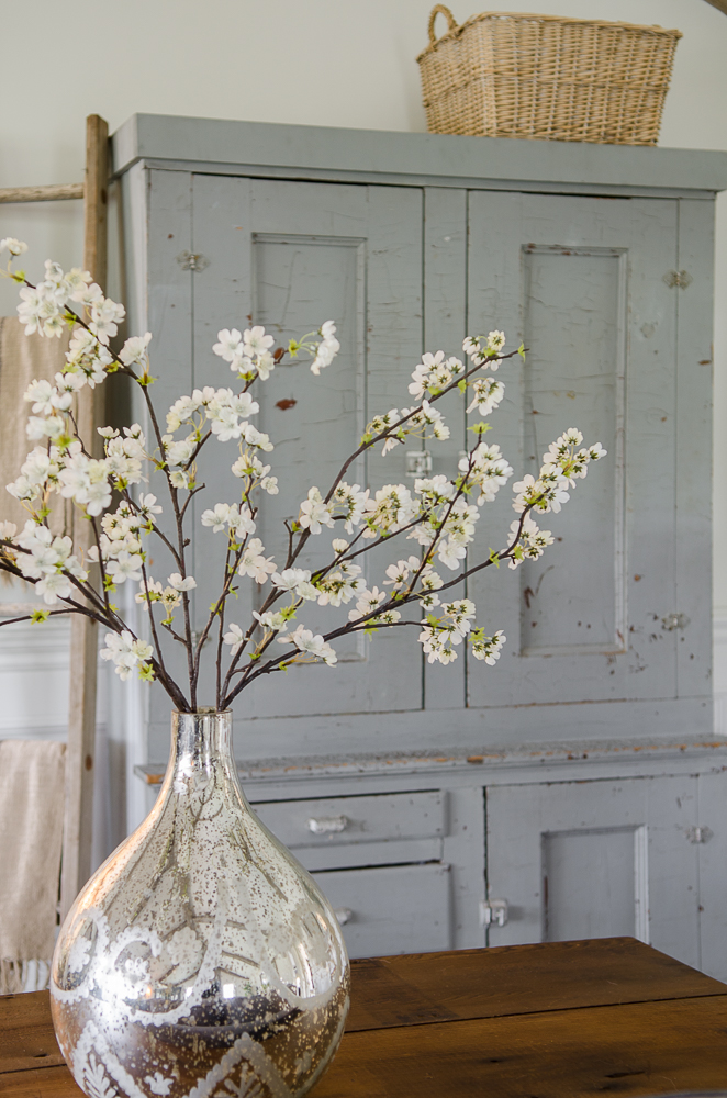 Light and Bright family room refresh in 5 easy steps-Chippy Cabinet-Mercury glass vase-Cherry Blossoms