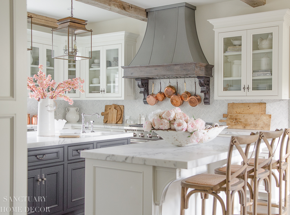 White kitchen with glass cabinets and dark center island- farmhouse kitchen-cottage kitchen-french country kitchen-Spring Decorating