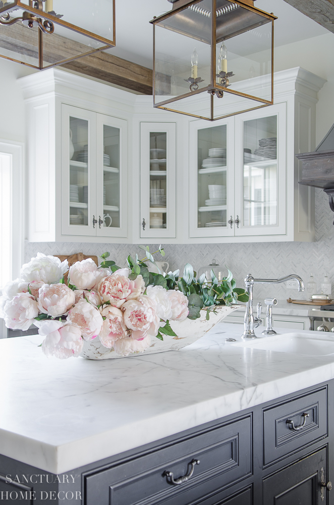 faux peonies in dough bowl