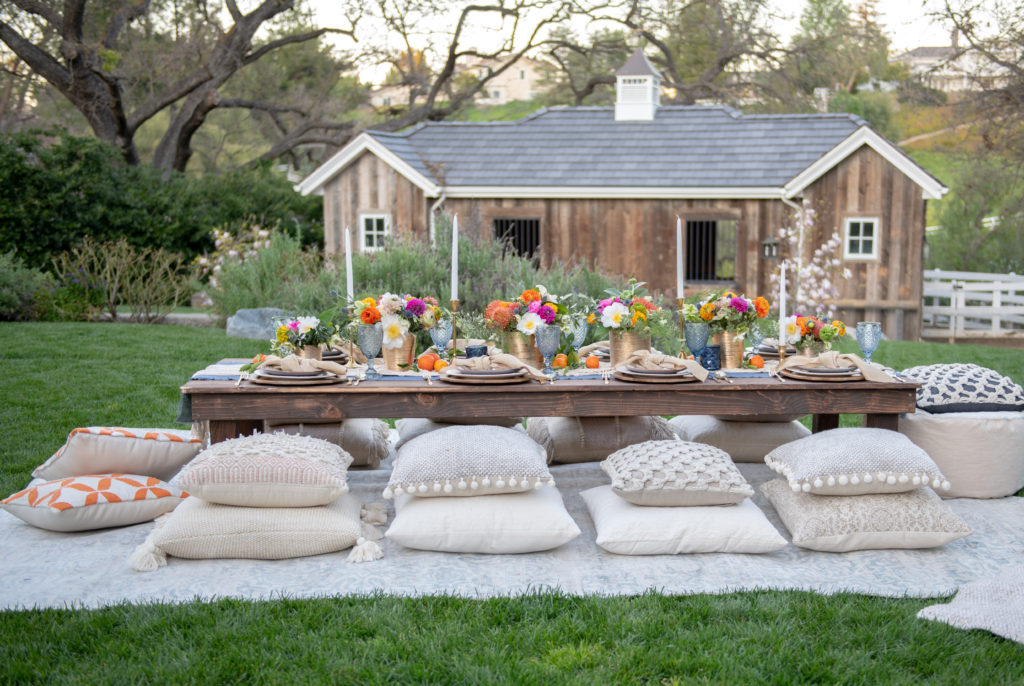 Bohemian table setting - macrame table runner - Poufs- Pillows- Moroccan Tablescape - Morocan Dinner Party- Moroccan Table Setting