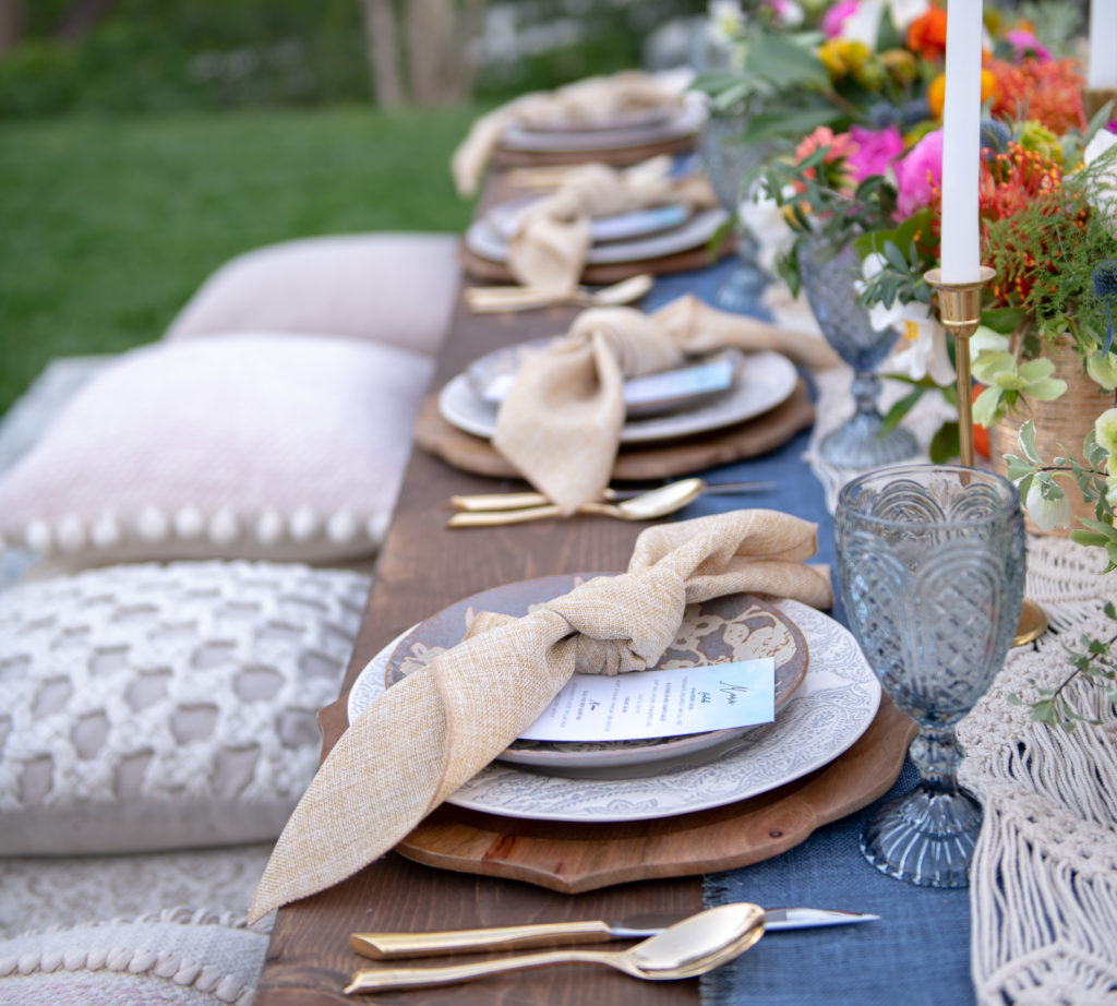 Bohemian table setting - macrame table runner - Poufs- Pillows- Moroccan Tablescape - Morocan Dinner Party- Moroccan Table Setting