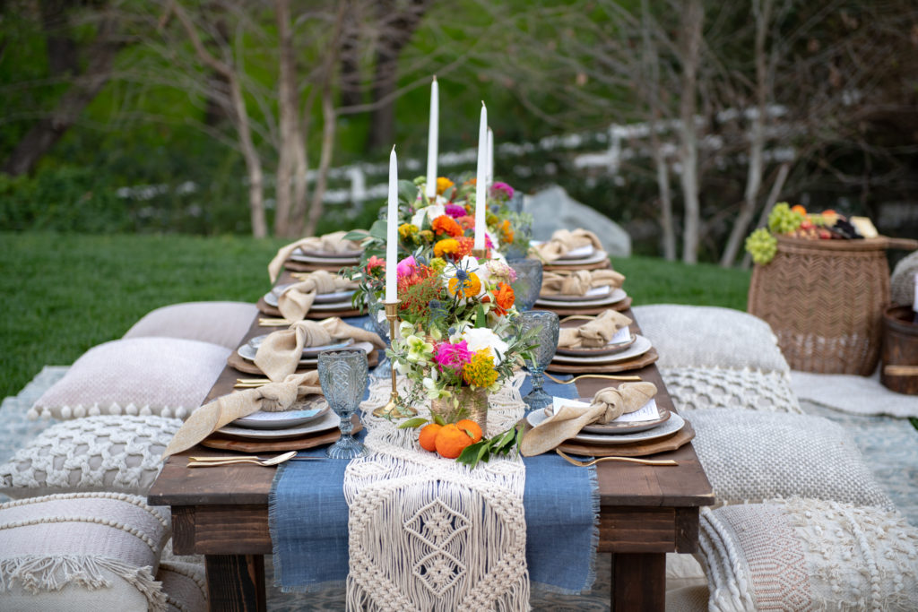 Bohemian table setting - macrame table runner - Poufs- Pillows- Moroccan Tablescape - Morocan Dinner Party- Moroccan Table Setting