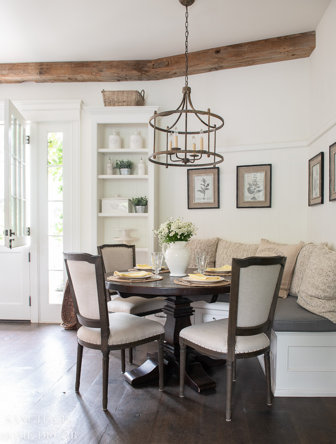 breakfast nook with banquette- round dining table