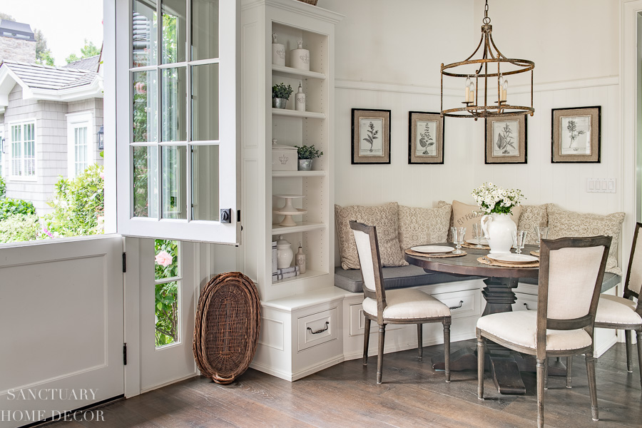 Breakfast nook with banquette and Dutch door