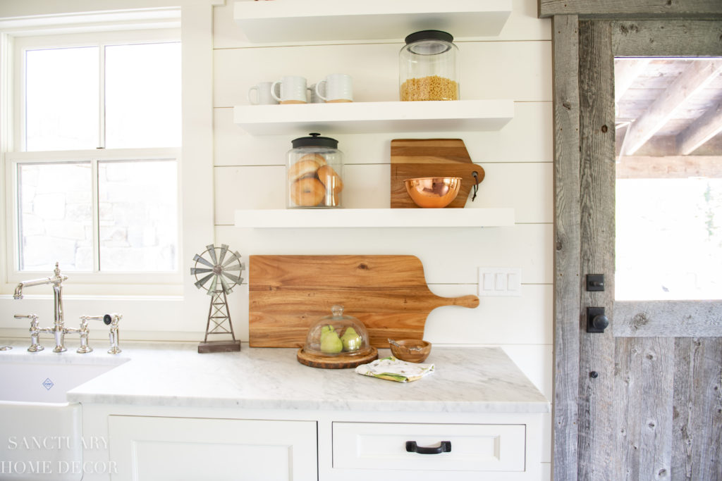 Small Farmhouse Kitchen design Ideas- Barn wood Door-Floating Shelves -Barn Light - Farmhouse Sink- Paneled Refrigerator