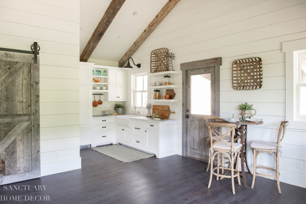 Small Farmhouse Kitchen design Ideas- Barn wood Door-Floating Shelves -Barn Light - Farmhouse Sink- Paneled Refrigerator - Sliding Barn Door - Shiplap Walls