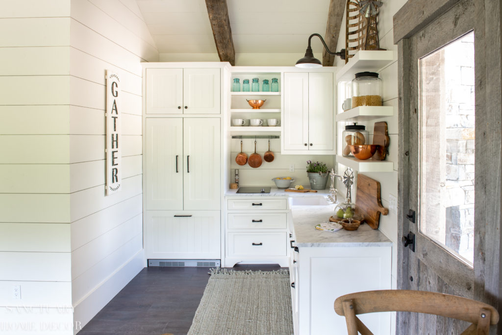 Small Farmhouse Kitchen design Ideas- Barn wood Door-Floating Shelves -Barn Light - Farmhouse Sink- Paneled Refrigerator