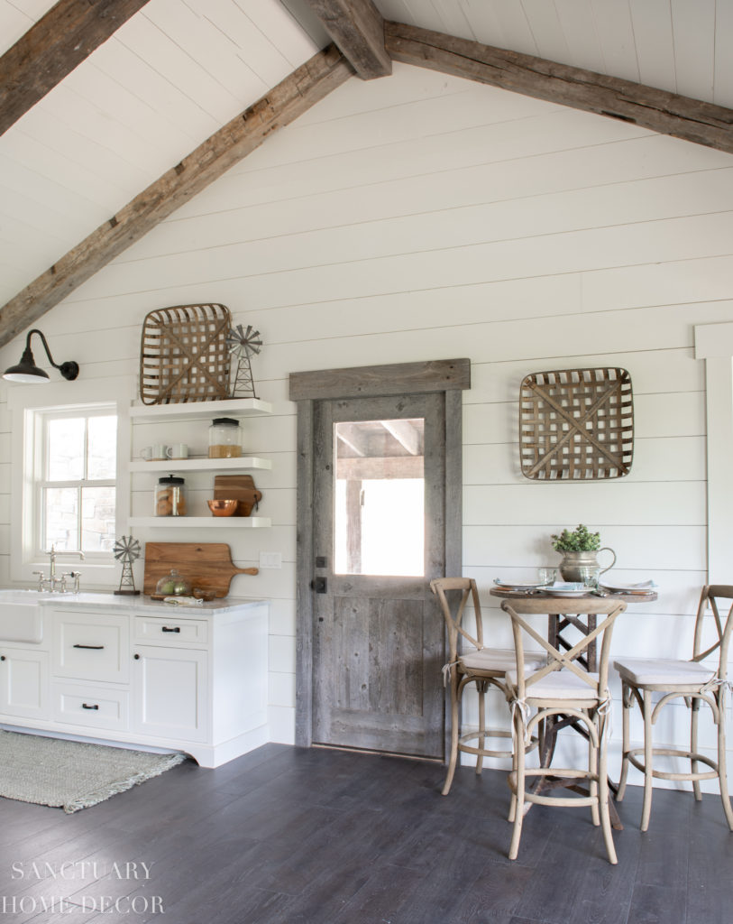 Small Farmhouse Kitchen design Ideas- Barn wood Door-Floating Shelves -Barn Light - Farmhouse Sink- Paneled Refrigerator