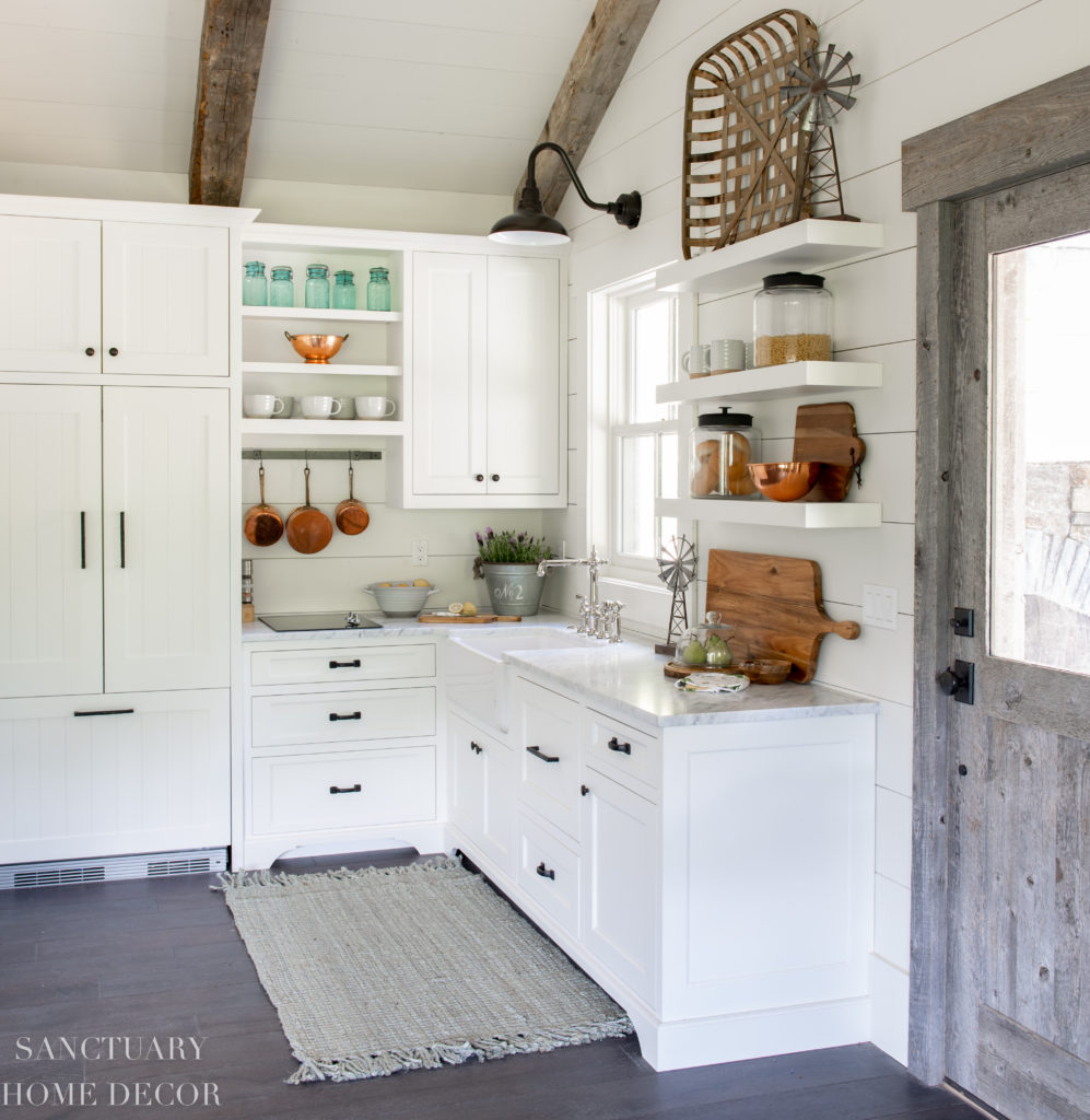 Small Farmhouse Kitchen design Ideas- Barn wood Door-Floating Shelves -Barn Light - Farmhouse Sink- Paneled Refrigerator