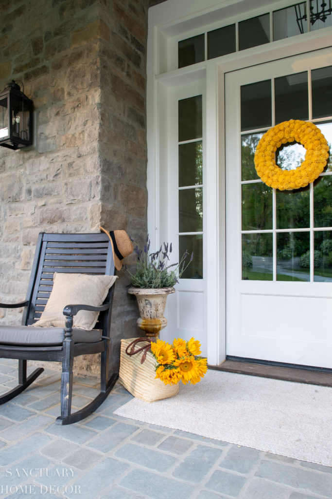 https://sanctuaryhomedecor.com/wp-content/uploads/2019/06/Summer-Front-Porch-Yellow-and-White-4-683x1024.jpg