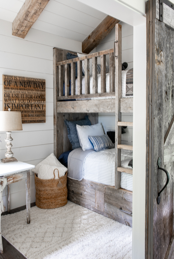 Kids Bunk Room with reclaimed wood bunk beds and shiplap.