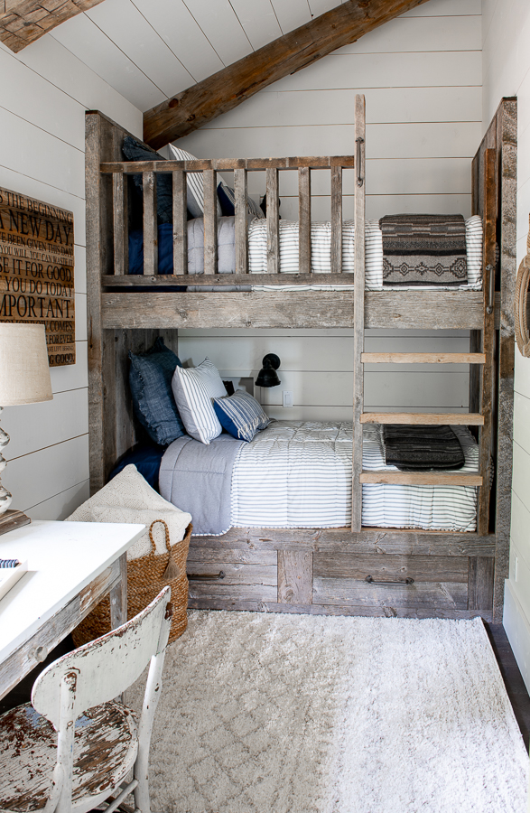 Kids Bunk Room with reclaimed wood bunk beds and shiplap.