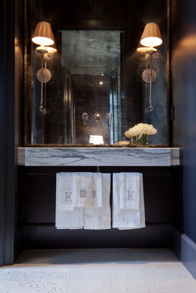 Modern farmhouse bath with antique mirror