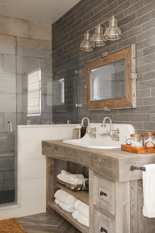 Rustic bath with barn wood vanity and double basin sink